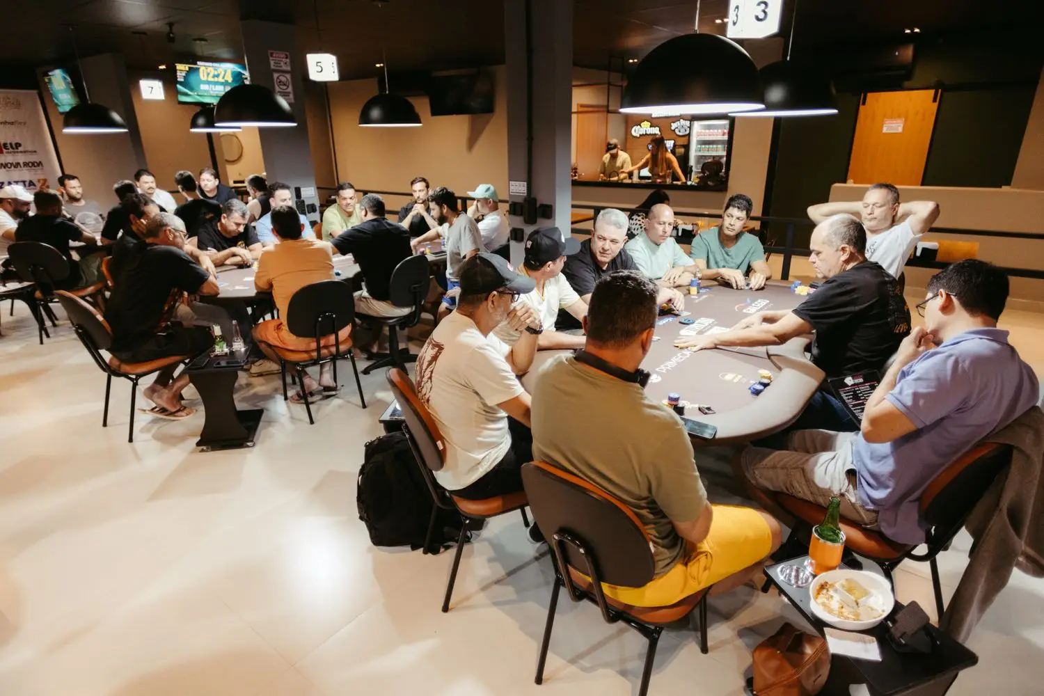 Atmospheric live poker tournament hall
